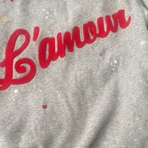 Grey sweatshirt with motif. Divided brand. L’amour.